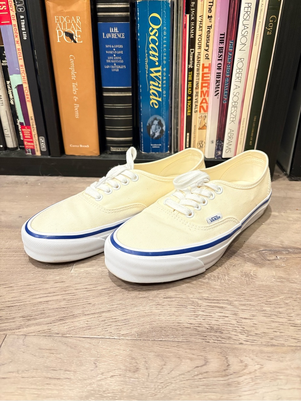 Vans Womenโs authentic Canvas Sneakers in Cream with Blue Trim